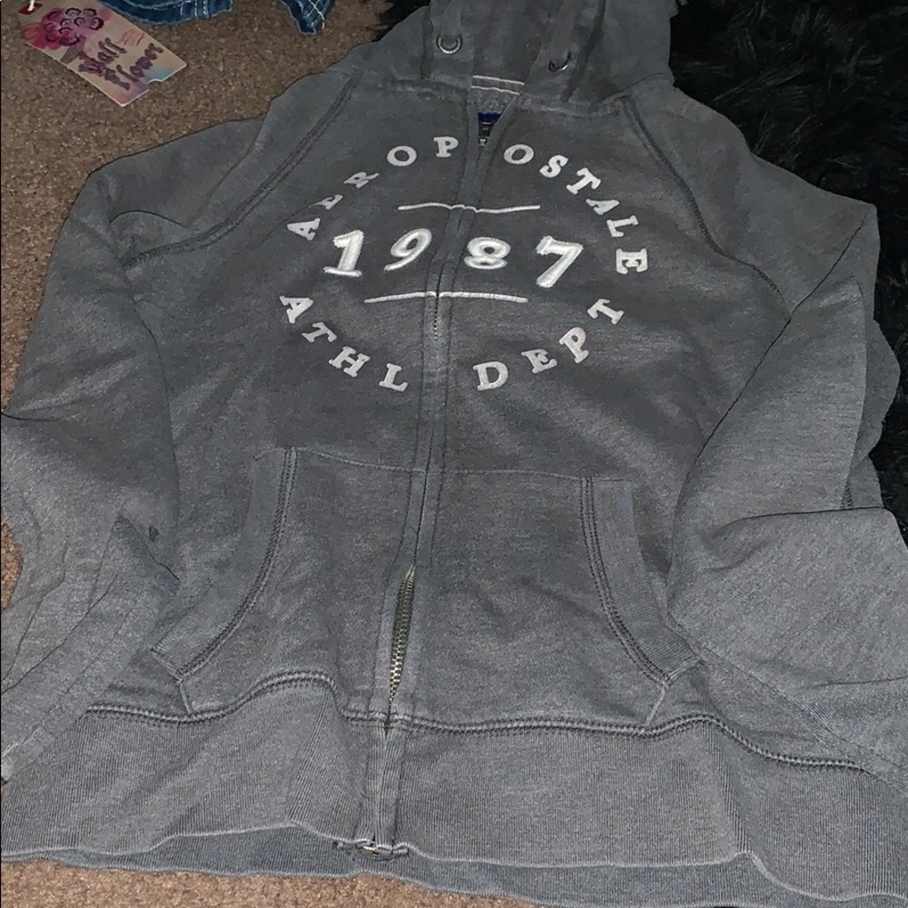 Grey and white zip up sweater